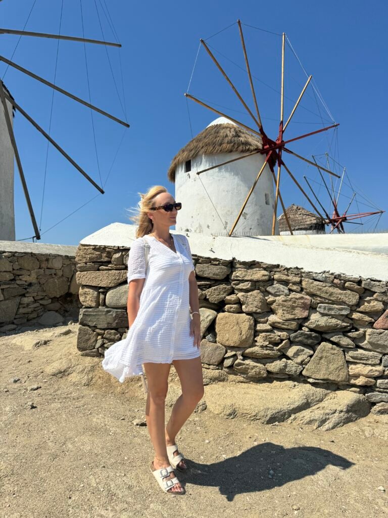 Me at the windmills in Mykonos Greece